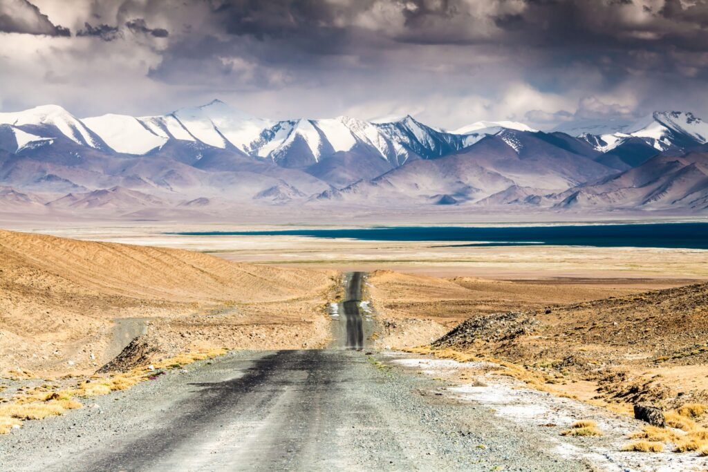 The World Still Has Places Where the Signal Disappears. Here Is Where to Find Them — and Why It Matters More Than Ever 3 Tajikistan Pamir Highway Karakul Lake ss scaled 1